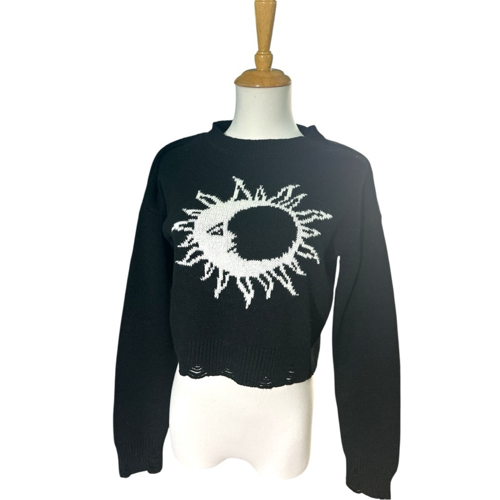 Black Sweater with White Sun Design